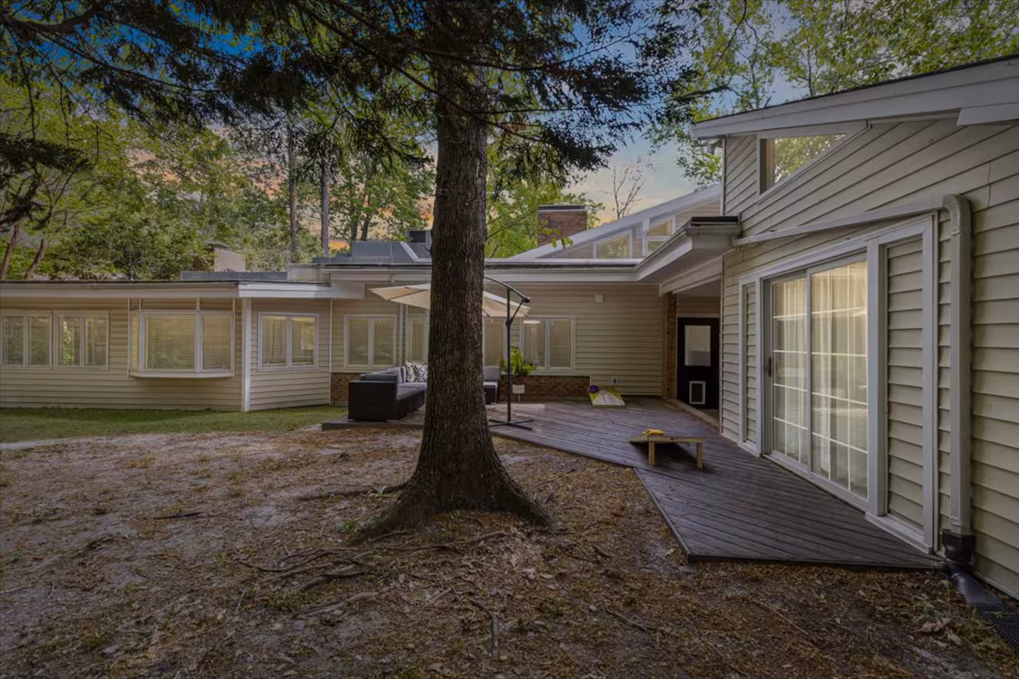 Outdoor oak tree at the Forest Hill Residence short-term rental in Greenville, NC
