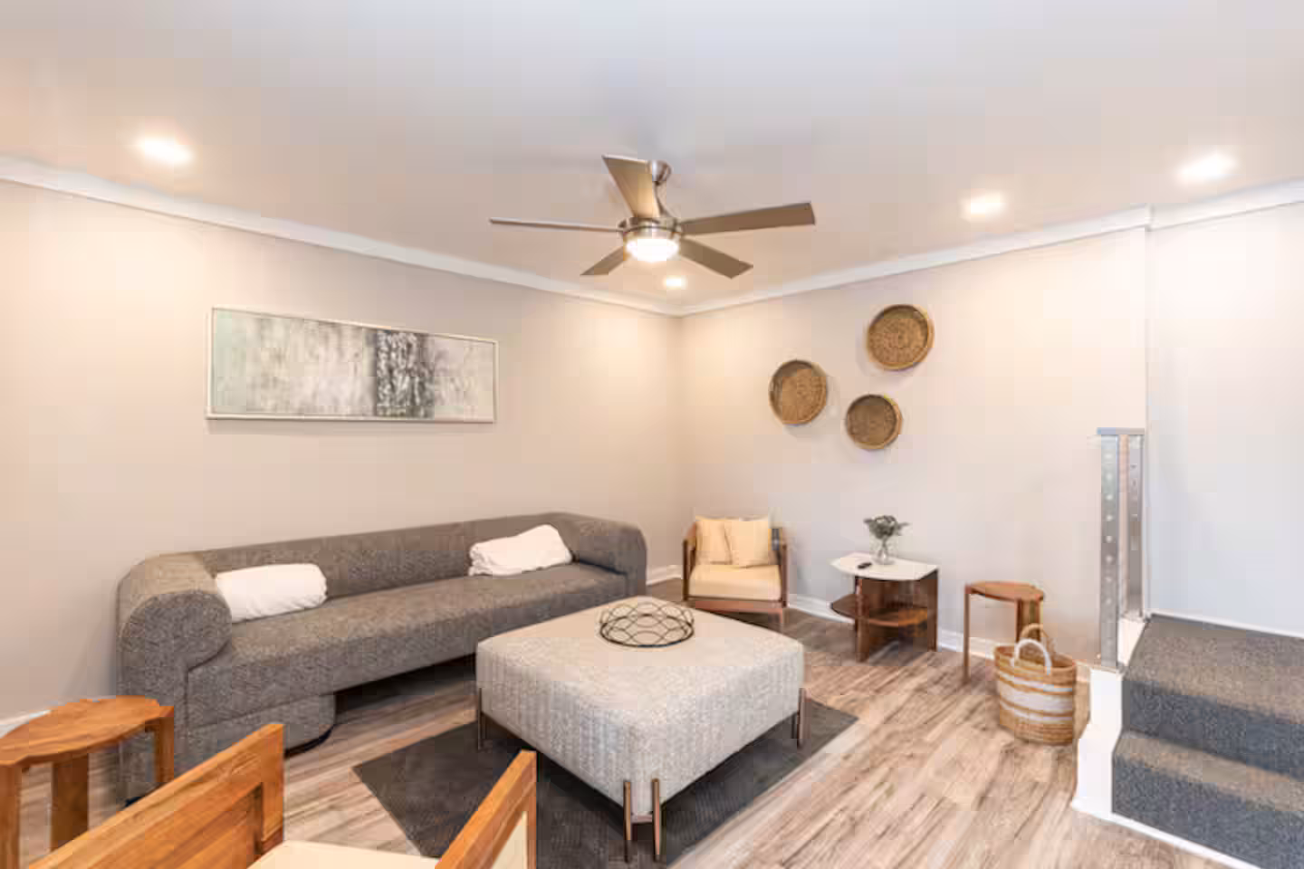 Warm lakefront living room interior at a Bello Homes managed lake house short-term rental