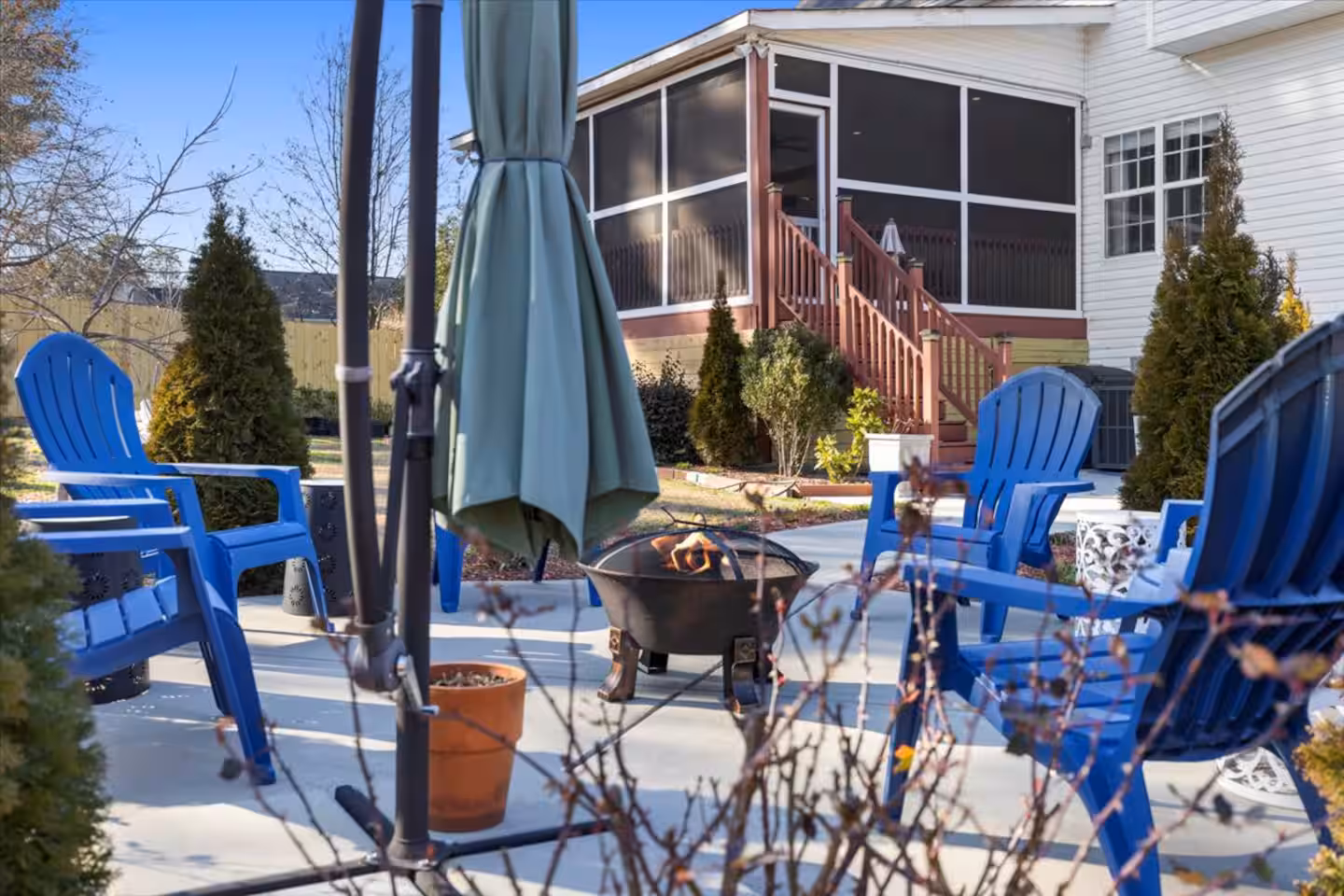 Outdoor living area in the backyard at Oporto, a Bello Homes short-term rental