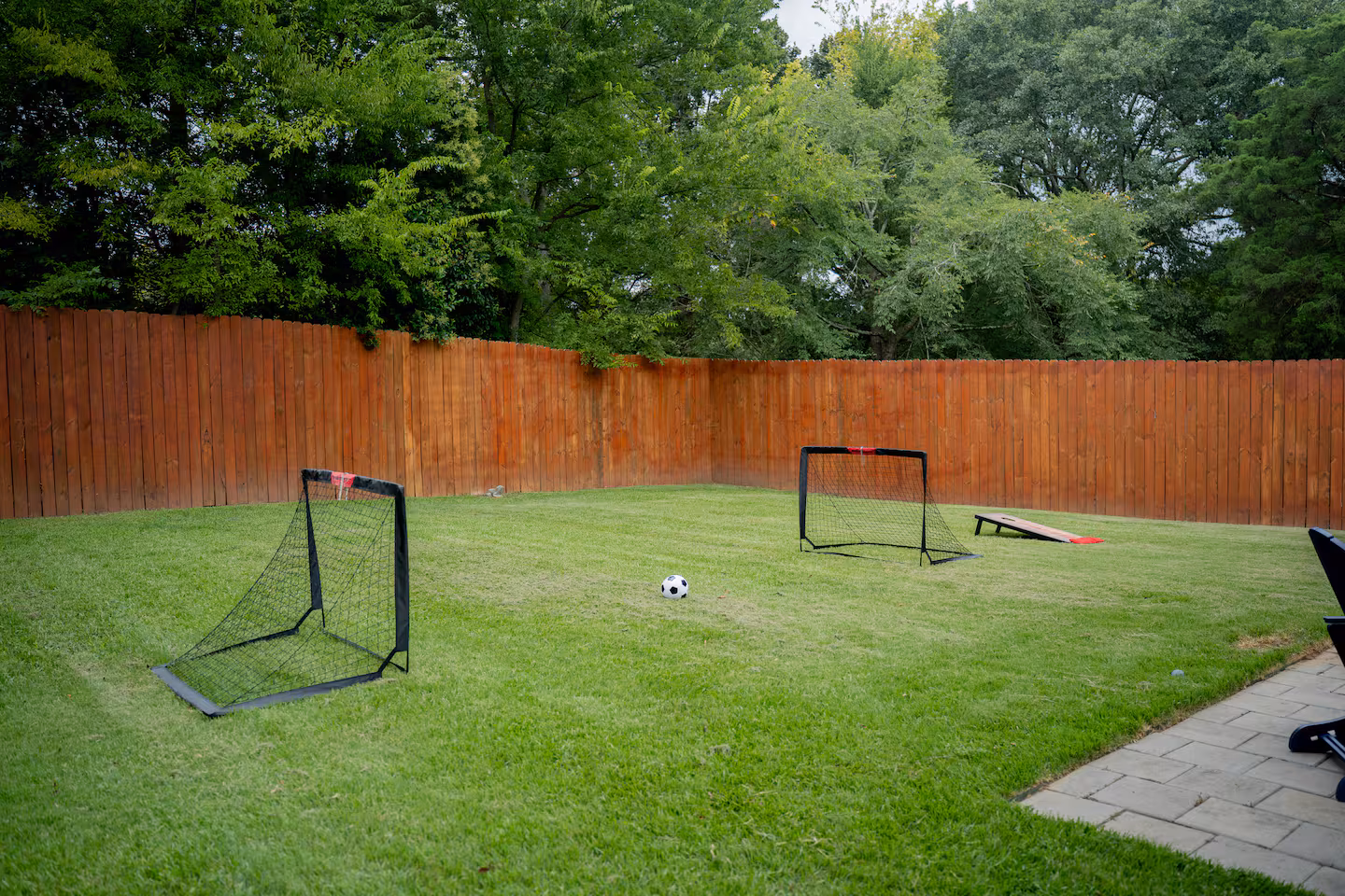 Backyard with mini-soccer pitch at Rimrock, a Bello Homes managed short-term rental