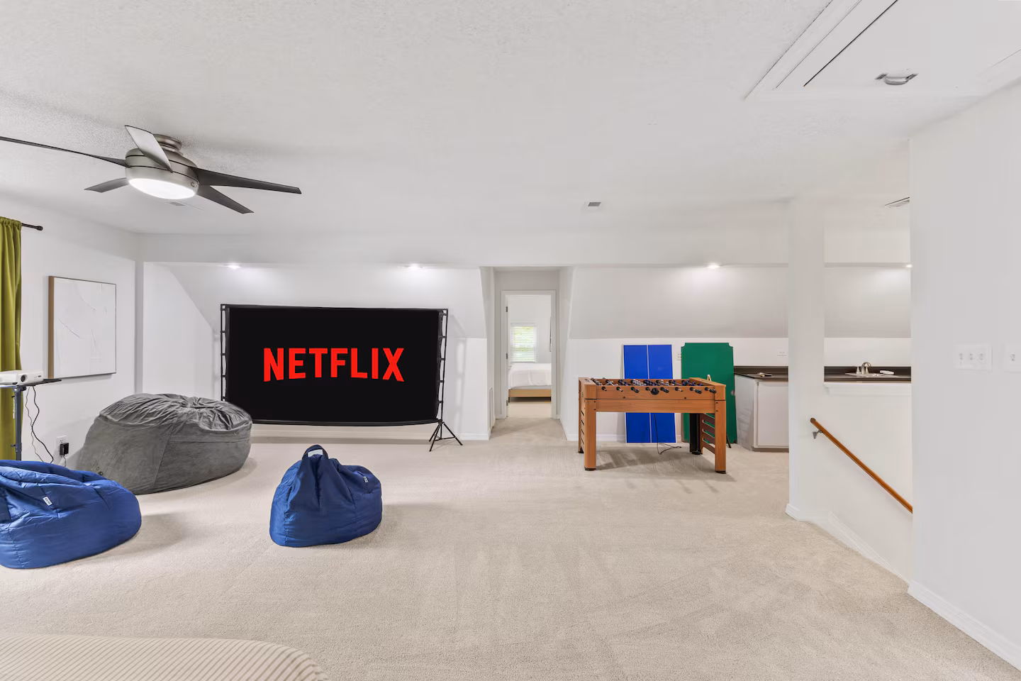 Movie-ready entertainment lounge at the Wiljohn Home, a Bello Homes short-term rental
