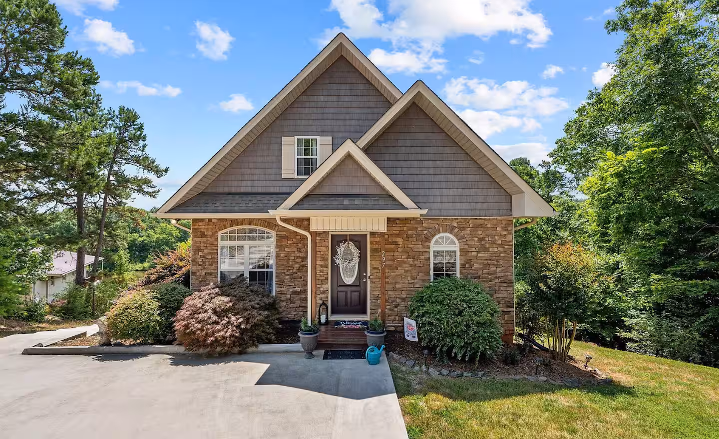 Lakefront exterior of the Zane Home, a Bello Homes vacation rental in Leasburg, NC
